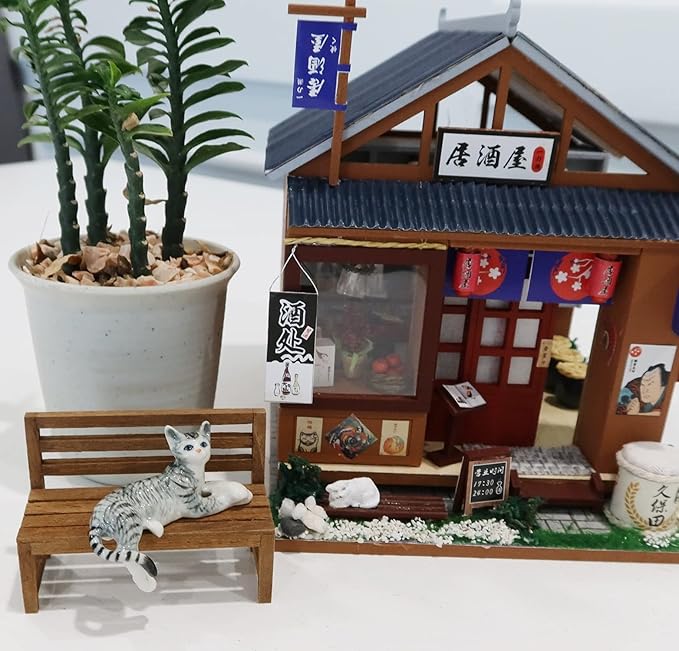 Ceramic Cat Figurine Relaxed Gray Tabby Porcelain Kitten Adorable Pet Kitty Collectible Miniatures Hand Painted Animal with Bench Home Decor or Gift